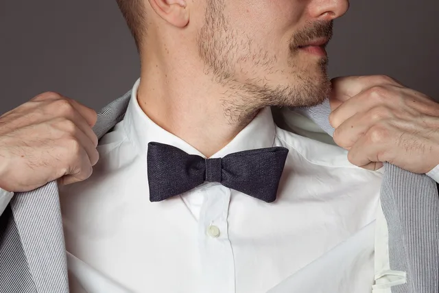 man, bow tie, denim, fashion man, formal wear, style, white shirt, pinstripe, blazer, beard, studio photography, accessories, menswear, elegant, groomed beard, clothing, detail, male style, casual chic. Why does a business casual review mean nothing without a real test?