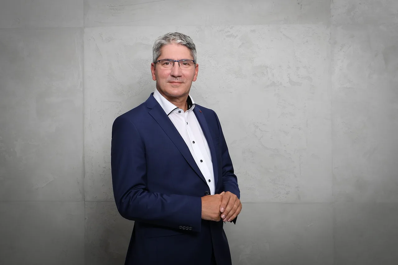 portrait, man, businessman, stylish outfit, formal wear, suit, office attire, middle-aged man, formal wear, middle-aged man, middle-aged man, middle-aged man, middle-aged man, middle-aged man. Business Professional Attire: What the Dress Code Actually Requires