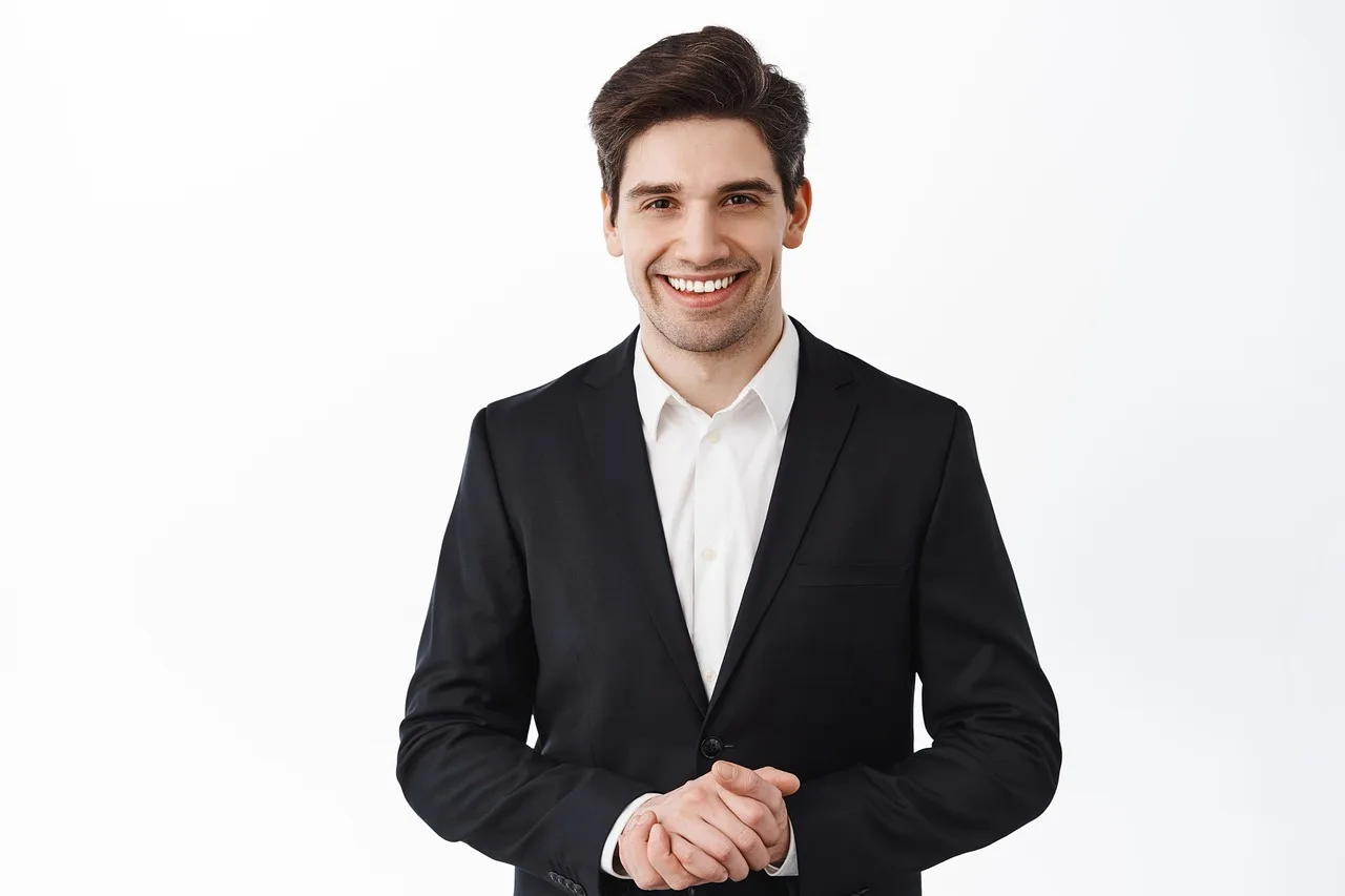 man, portrait, business, smile, formal, suit, work attire, male, professional, white shirt, jacket, classic attire, businessman, tie, modern, fresh, friendly, elegant, confident, young. Six industries compared: who actually decides the dress code