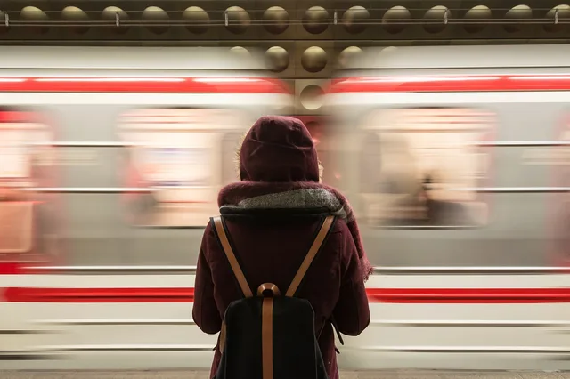 train, station, transportation, people, girl, waiting, passengers, travel, trip, brown travel, brown train, train, waiting, waiting, waiting, waiting, waiting. A 30-Day Test Settles the Work Tote vs Backpack for Commute Debate